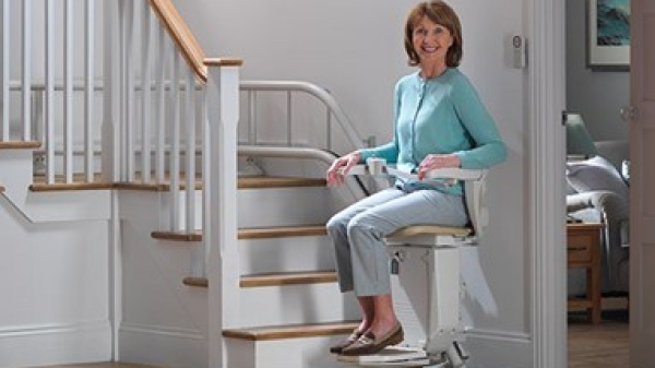 Someone using a stairlift 